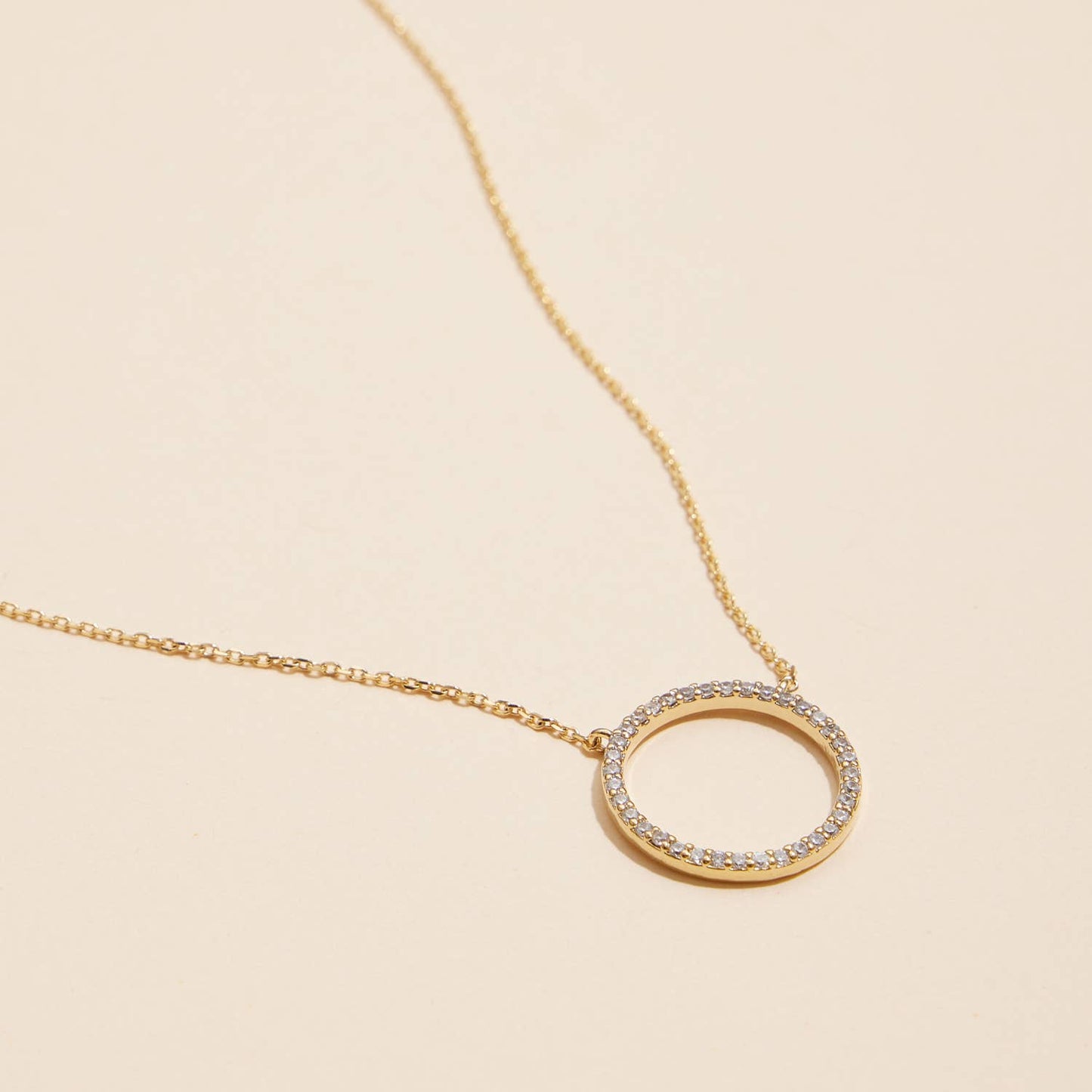 Gold Circle Pendant Necklace with CZ Accents